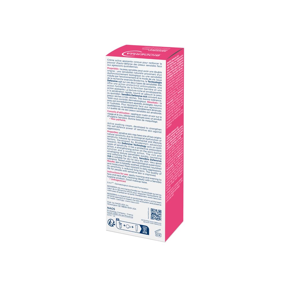 Pink and white product packaging with text on a white background