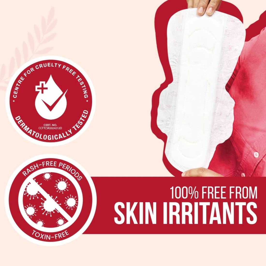 Product packaging with a hand holding a white pad, featuring cruelty-free, dermatologically tested, and skin irritant-free labels on a red and beige background.