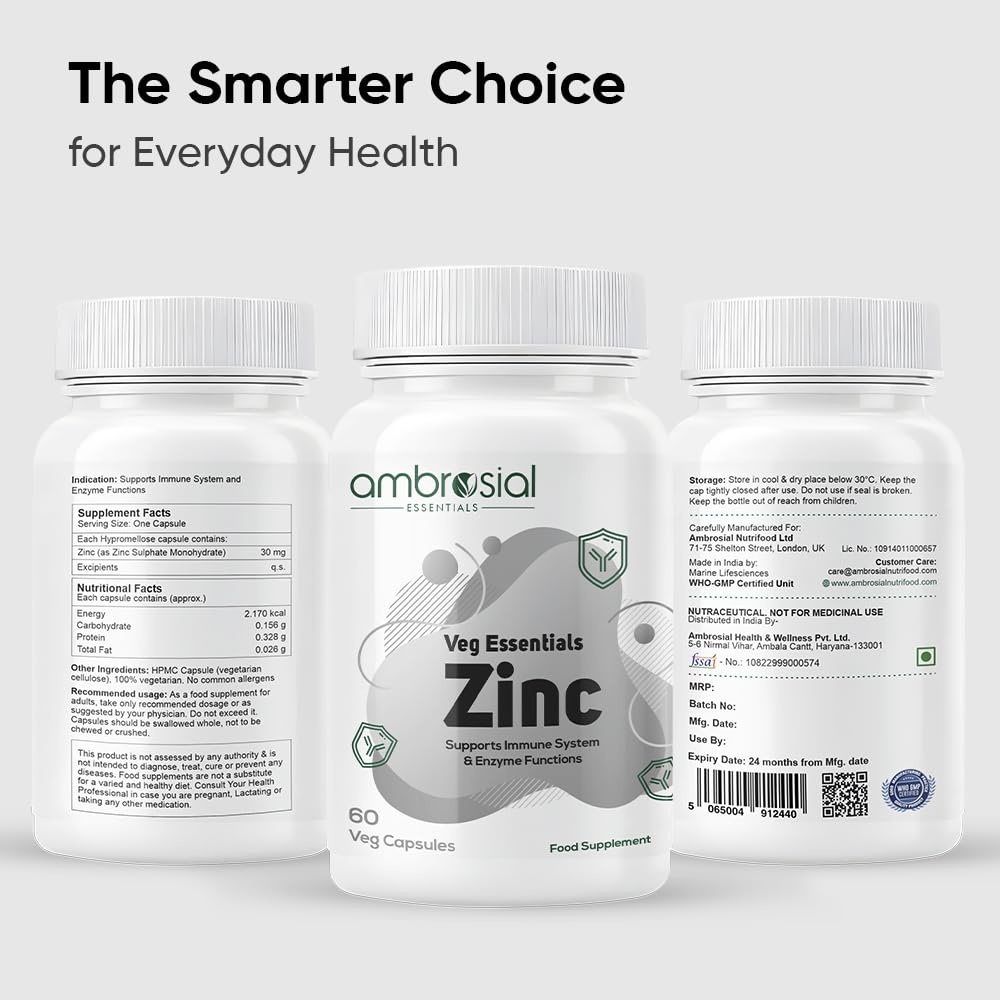 Three bottles of ambrosial Veg Essentials Zinc supplement on a light gray background.