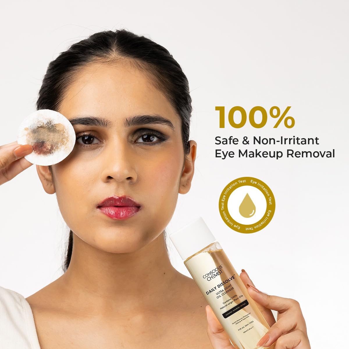 Woman using eye makeup removal product with text '100% Safe & Non-Irritant Eye Makeup Removal'.