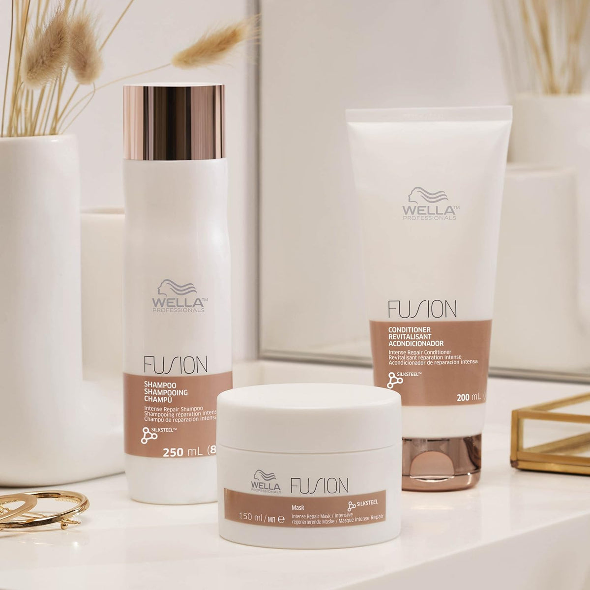 Wella Fusion hair care products on a neutral background