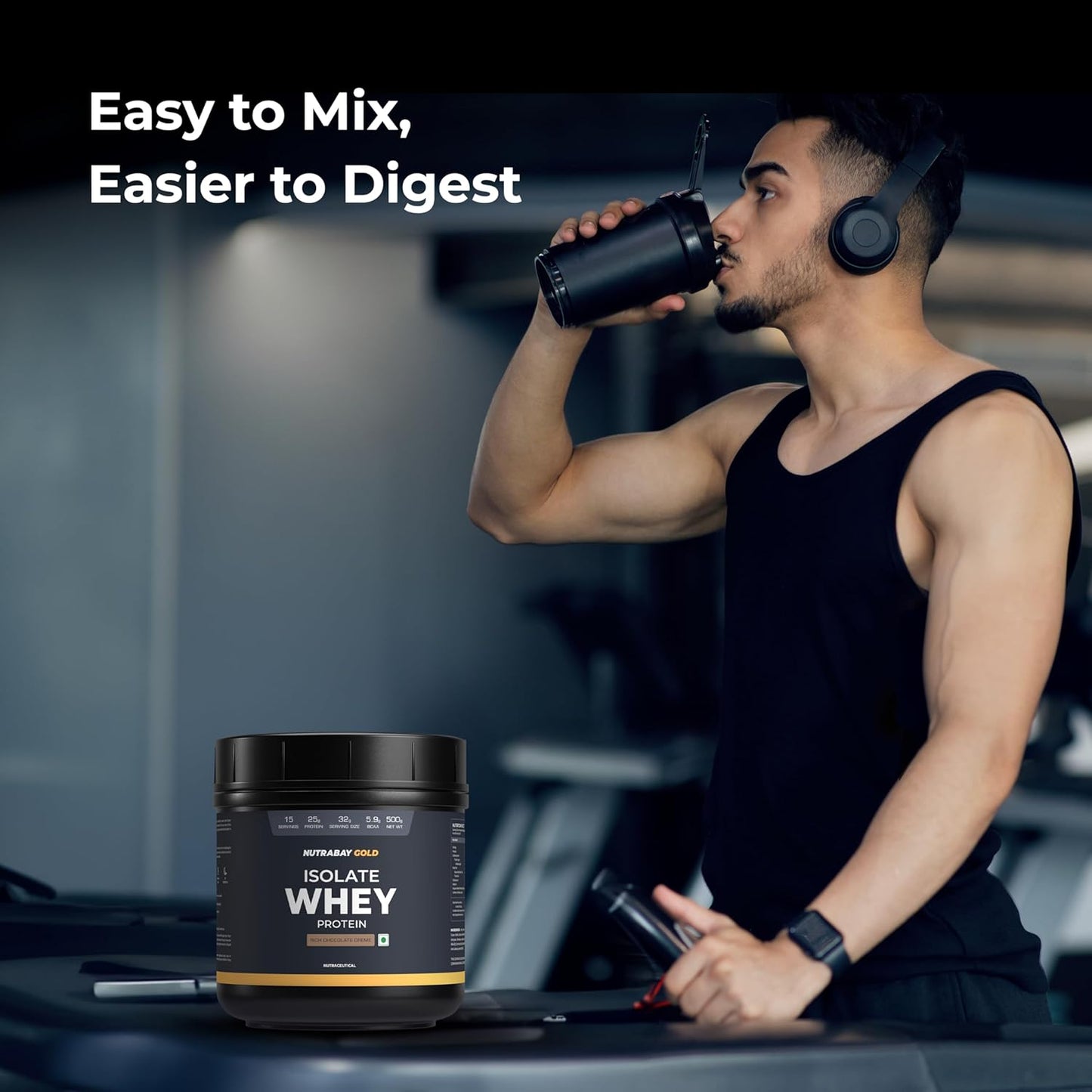 Man drinking from a protein shaker with isolate whey protein container in foreground