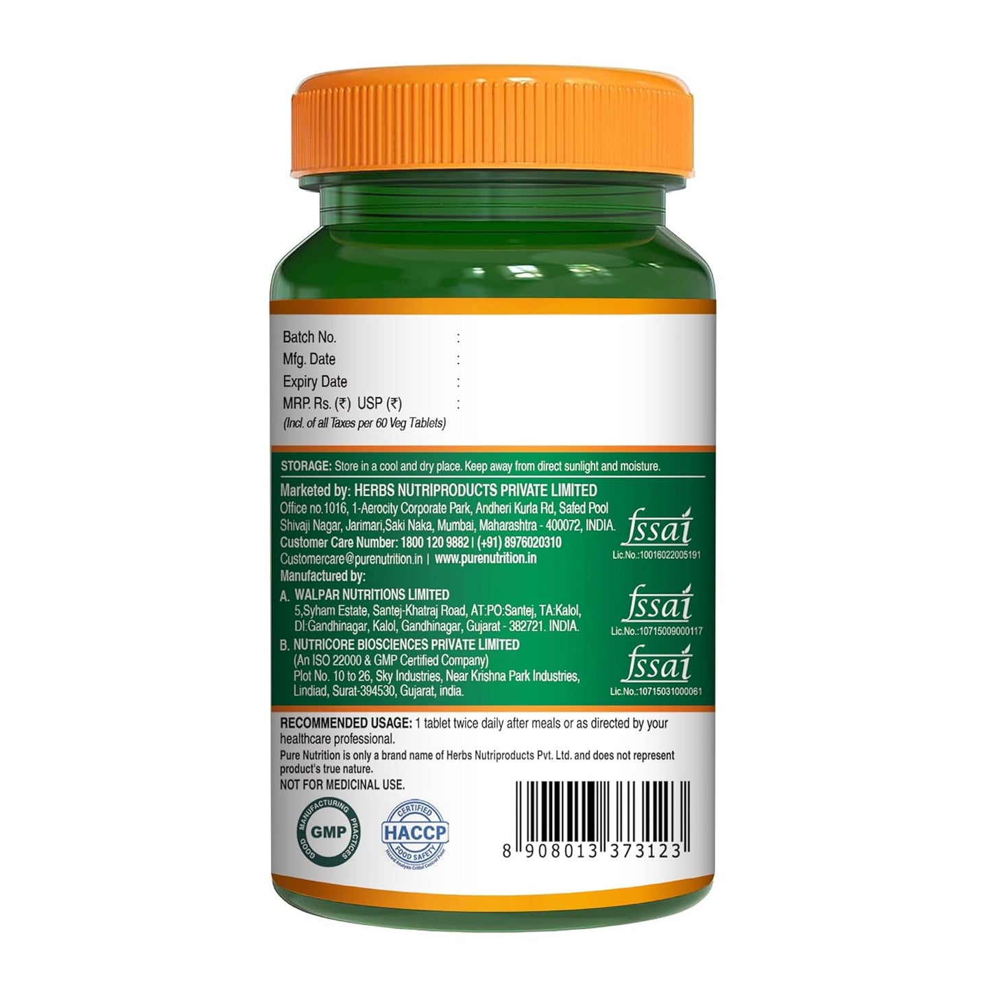 Green supplement bottle with orange cap on a white background