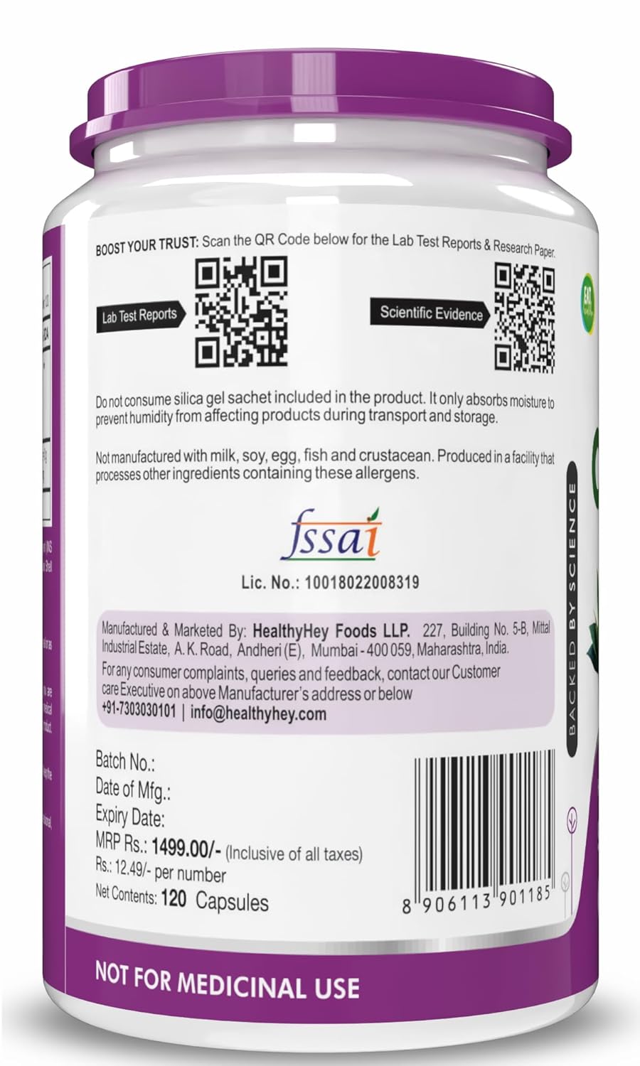Back view of a supplement container with purple lid and white body, displaying text and QR codes.