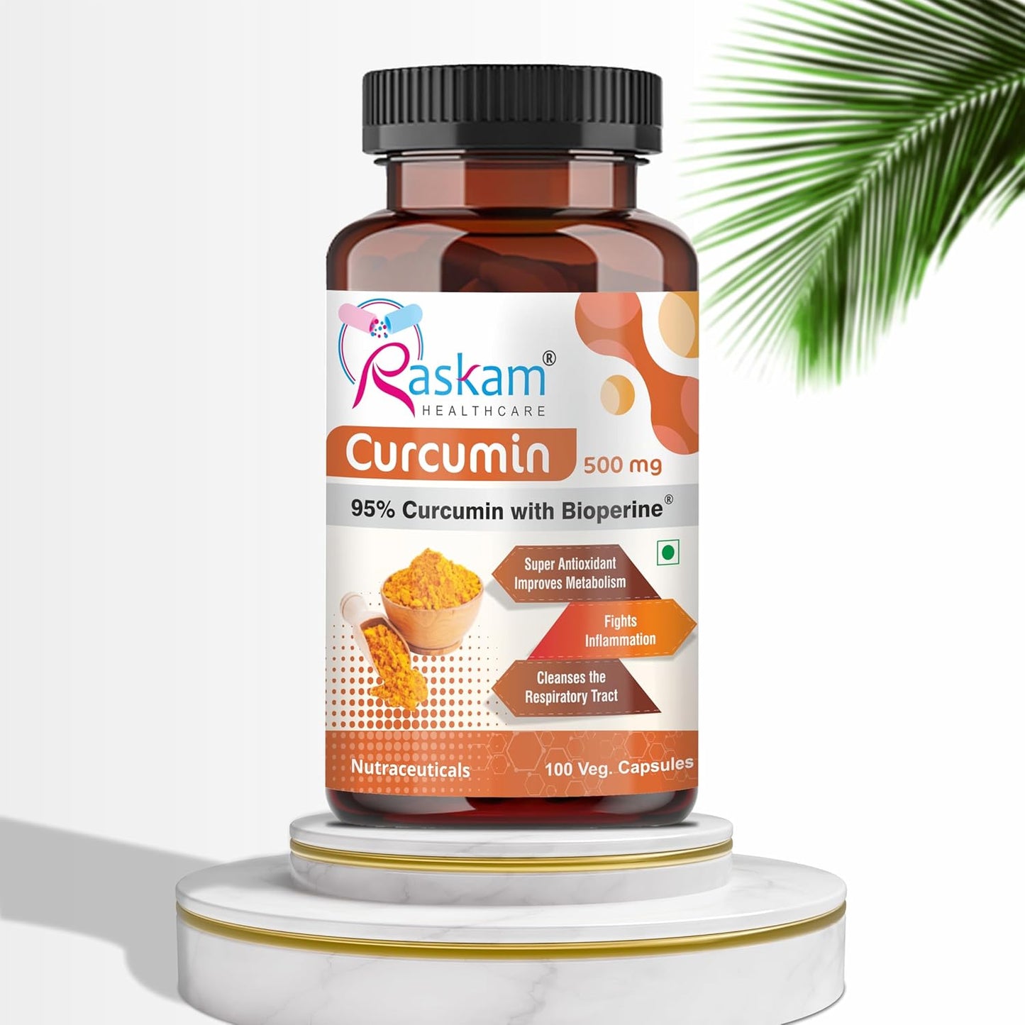 Bottle of Raskam Curcumin supplement on a white background with a palm leaf.