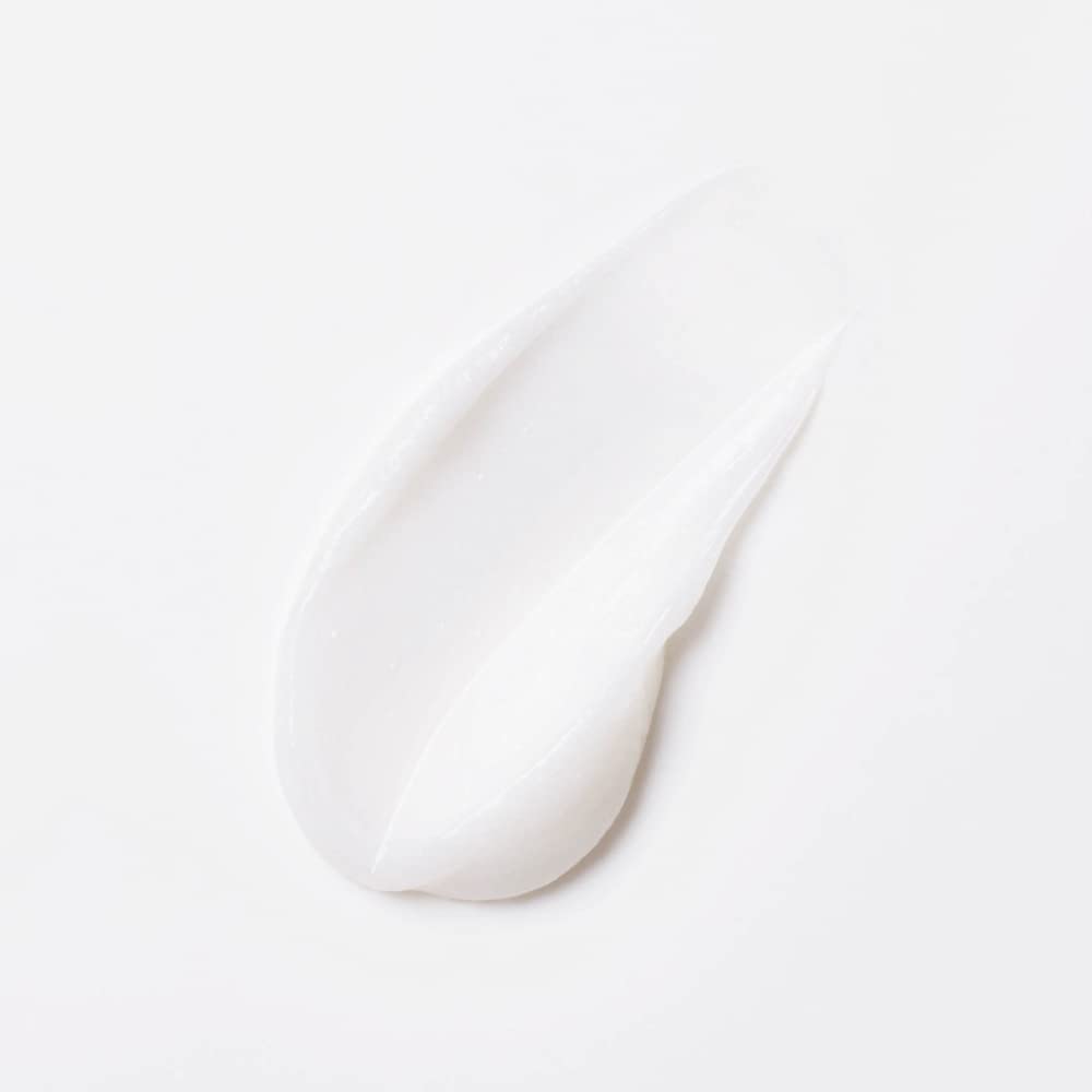 White ceramic spoon on a white background