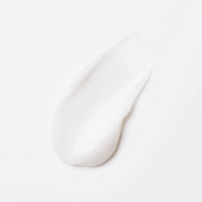 White ceramic spoon on a white background