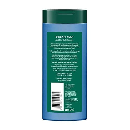 Shampoo bottle with green label on a white background