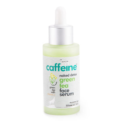 Caffeine face serum bottle with dropper on a white background