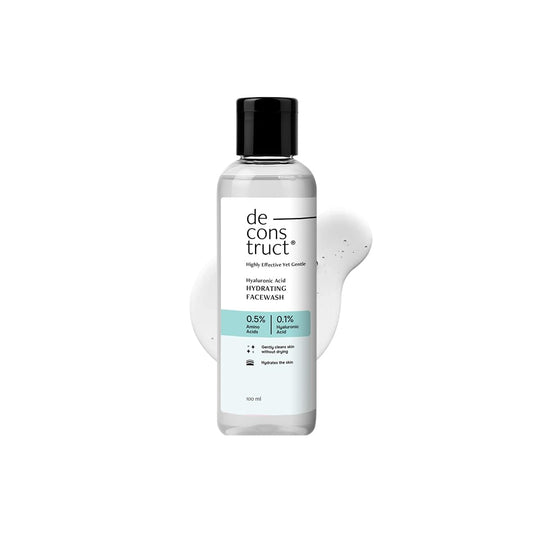 Bottle of de construct facial wash on a white background