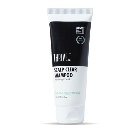 Thrive Scalp Clear Shampoo bottle on a white background