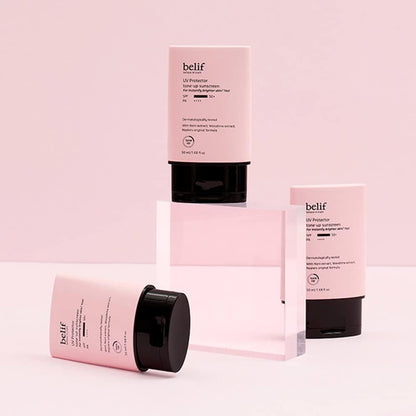 Pink skincare product with 'belif' branding on a light pink background