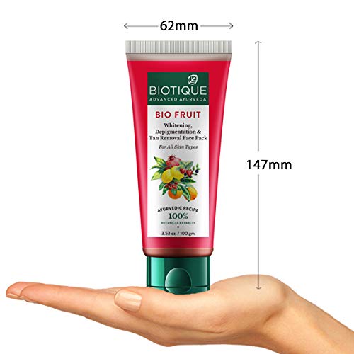 Biotique Bio Fruit face pack tube held in a hand with measurements indicated.