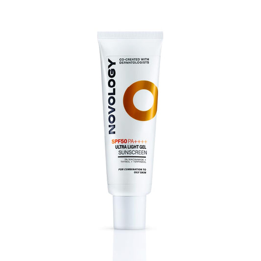 Novology sunscreen tube on a white background