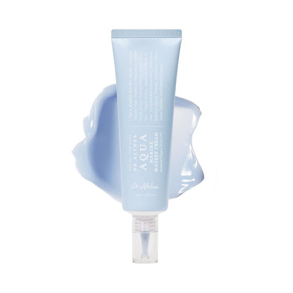 Tube of light blue cream with a white background
