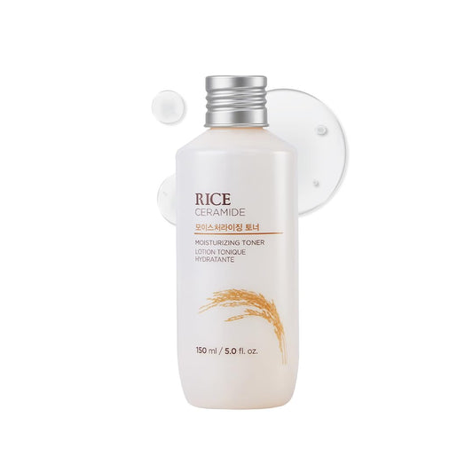 White bottle of rice ceramide toner with a silver cap on a white background