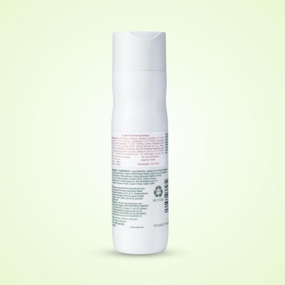 White cylindrical container with text on a light green background