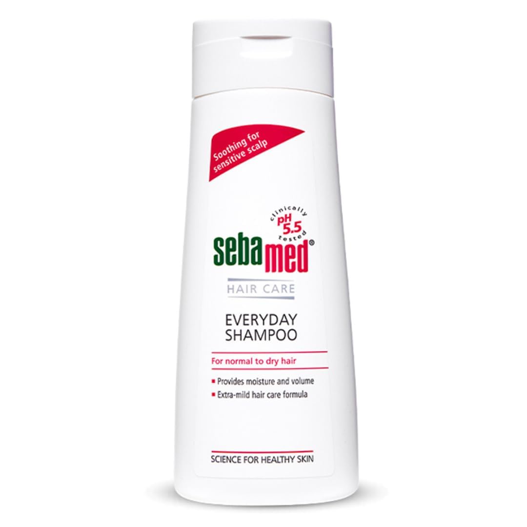 Sebamed shampoo bottle on a white background