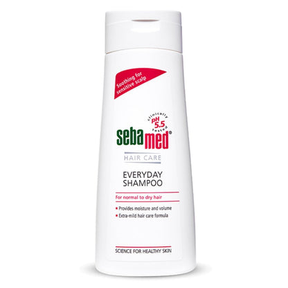 Sebamed shampoo bottle on a white background