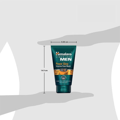 Himalaya Men's Power Glow Licorice Face Wash tube held in a hand with dimensions displayed.