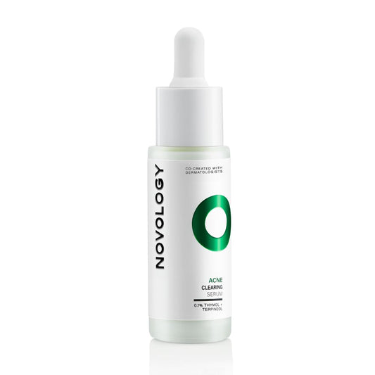 Novology acne clearing serum bottle on a white background