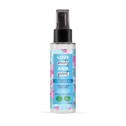 Spray bottle labeled 'Love Beauty and Planet' on a white background