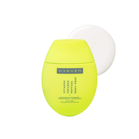 Yellow skincare product with white cap on a white background, featuring the brand 'Hyphen'.