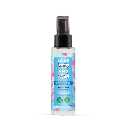 Spray bottle with floral design on a white background