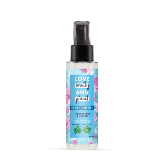 Spray bottle with floral design on a white background