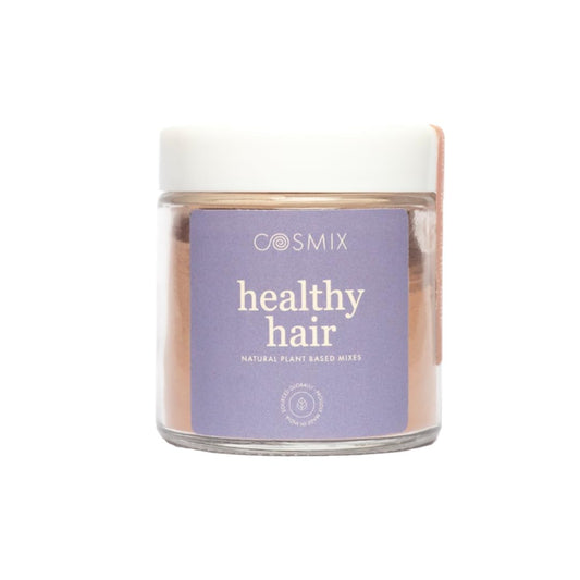 Cosmix healthy hair product in a jar on a white background