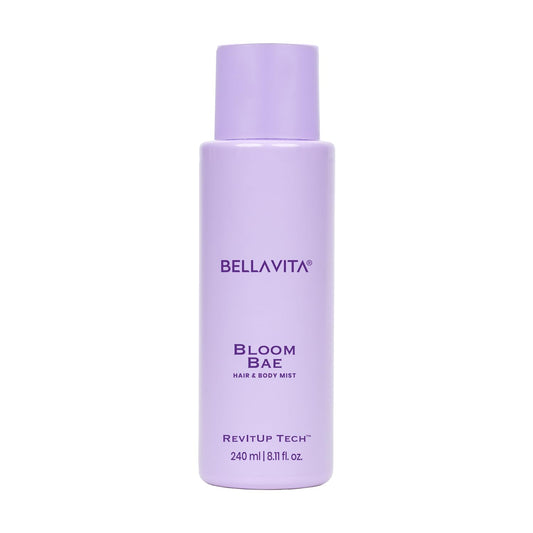 Purple bottle of Bellavita Bloom Bae hair and body mist on a white background
