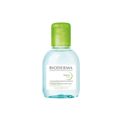 Bioderma bottle with green cap on a white background