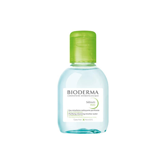 Bioderma bottle with green cap on a white background