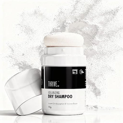 Thrive volumizing dry shampoo with a white cap on a light gray background