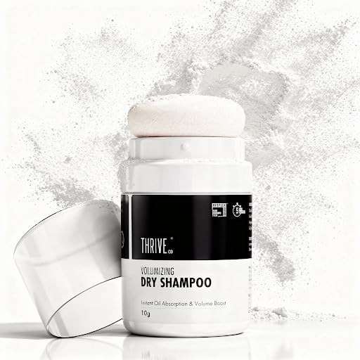 Thrive volumizing dry shampoo with a white cap on a light gray background