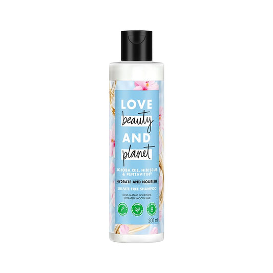 Bottle of 'Love Beauty and Planet' hair care product on a white background