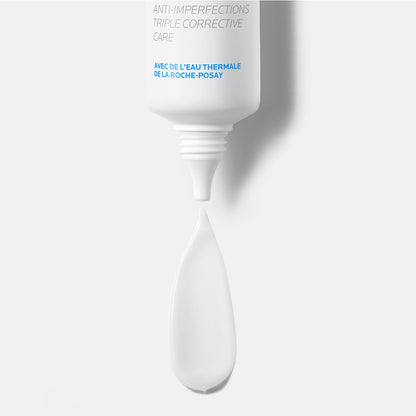 White cosmetic brush with La Roche-Posay branding on a white background