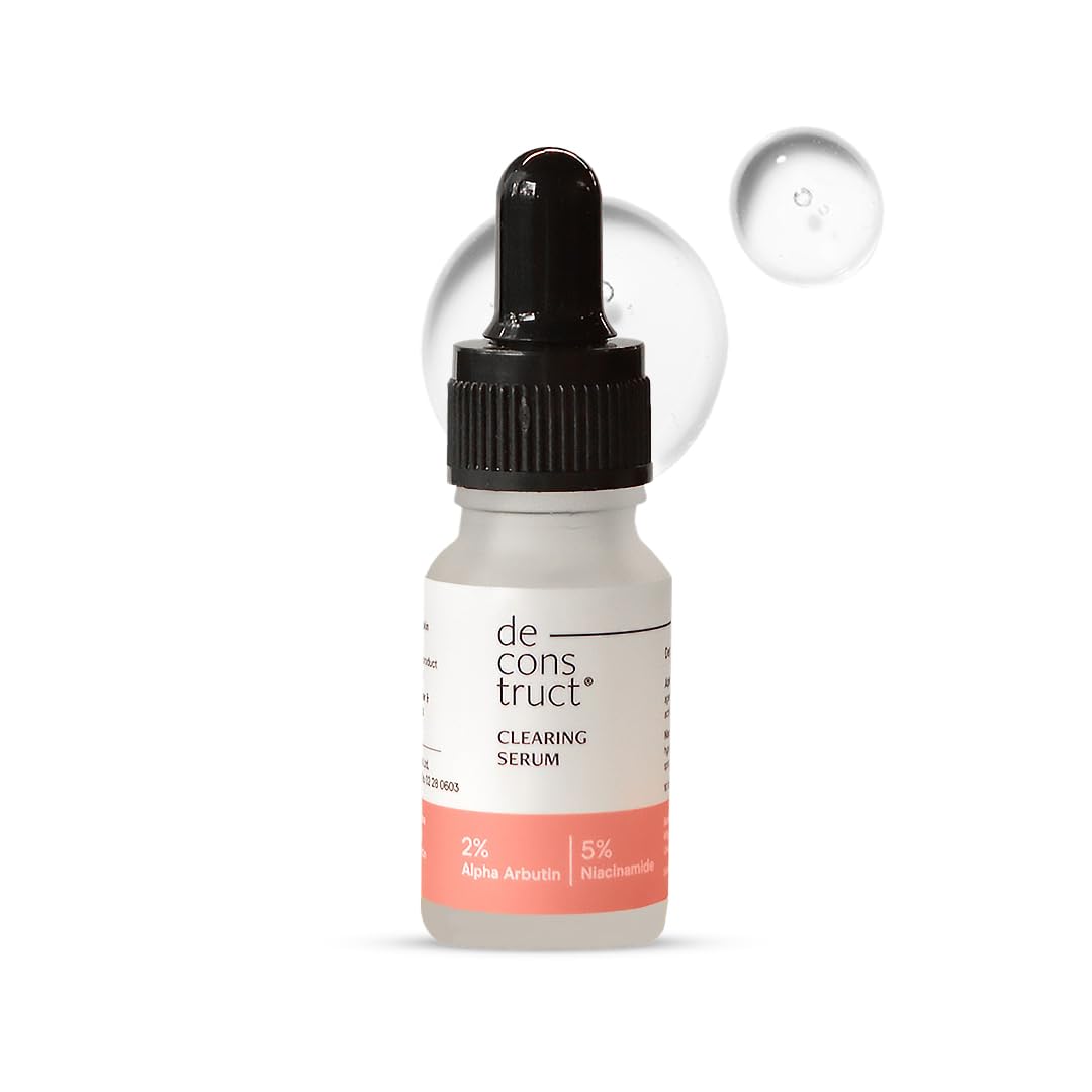 Clearing serum bottle with dropper on a white background