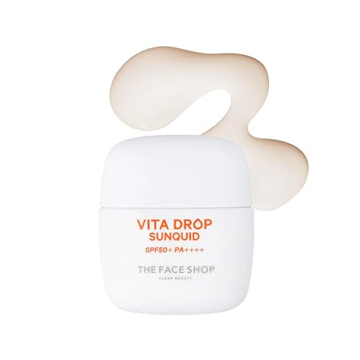 White skincare product with orange text on a white background