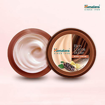 Himalaya Rich Cocoa Butter Body Cream jar on a light pink background
