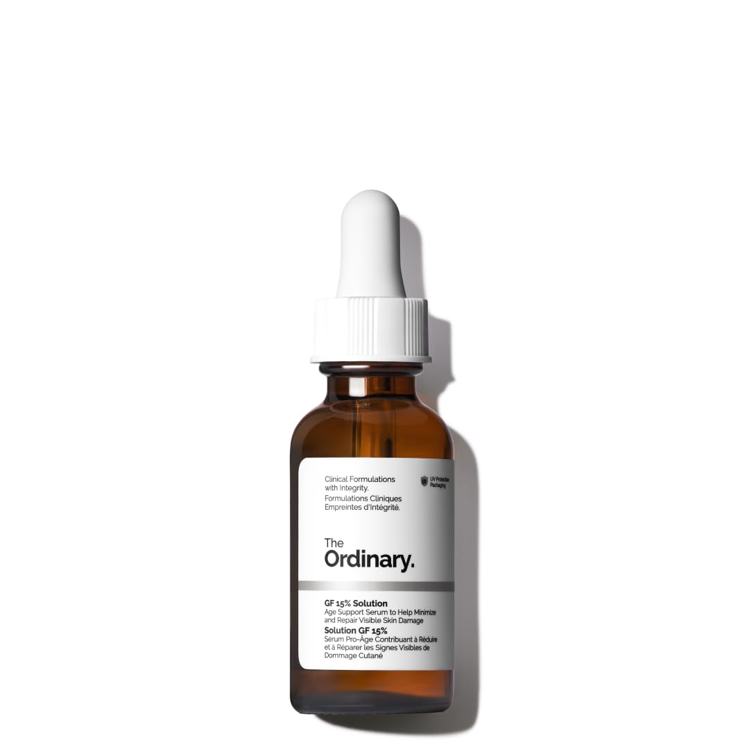 Brown glass bottle with white cap labeled 'The Ordinary' on a white background