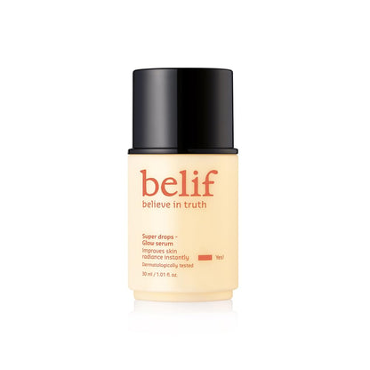 Skincare serum bottle with black cap and beige body on a white background