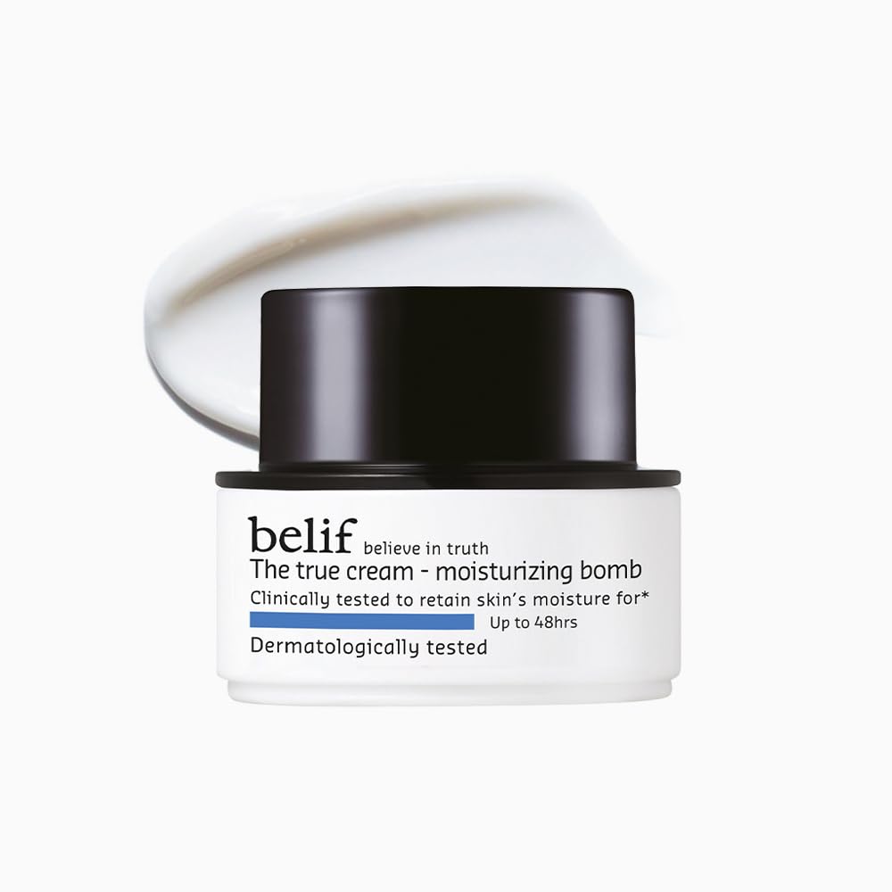 Skincare cream jar with black lid and white body on a white background