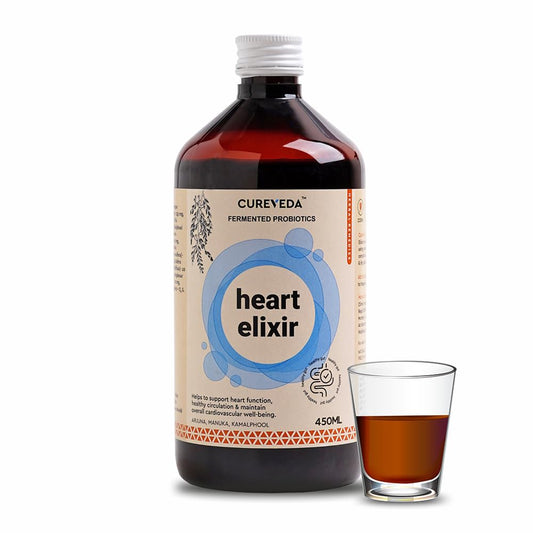 Cureveda Heart Elixir bottle with a glass of the elixir on a white background