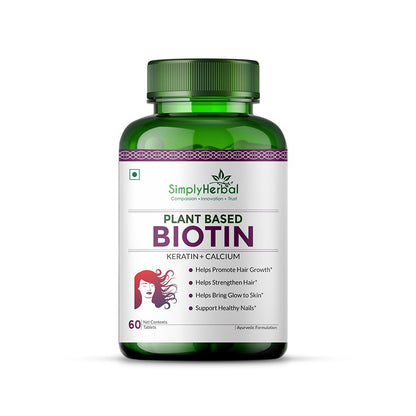 Green bottle of Simply Herbal Plant Based Biotin supplement on a white background