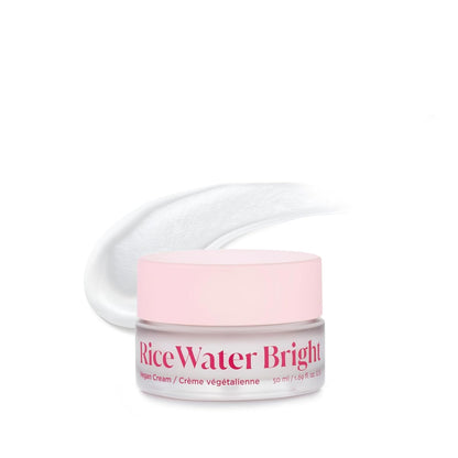 Jar of Rice Water Bright cream with pink lid on a white background