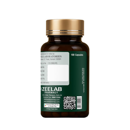 Brown supplement bottle with gold cap and Zeelab Pharmacy label on a white background