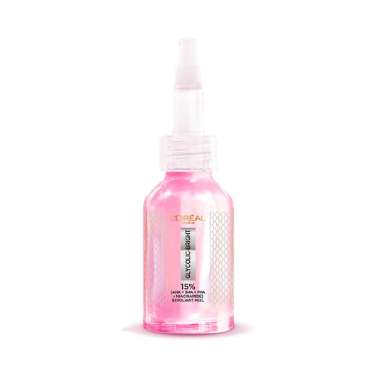 L'Oreal serum bottle with pink liquid on a white background