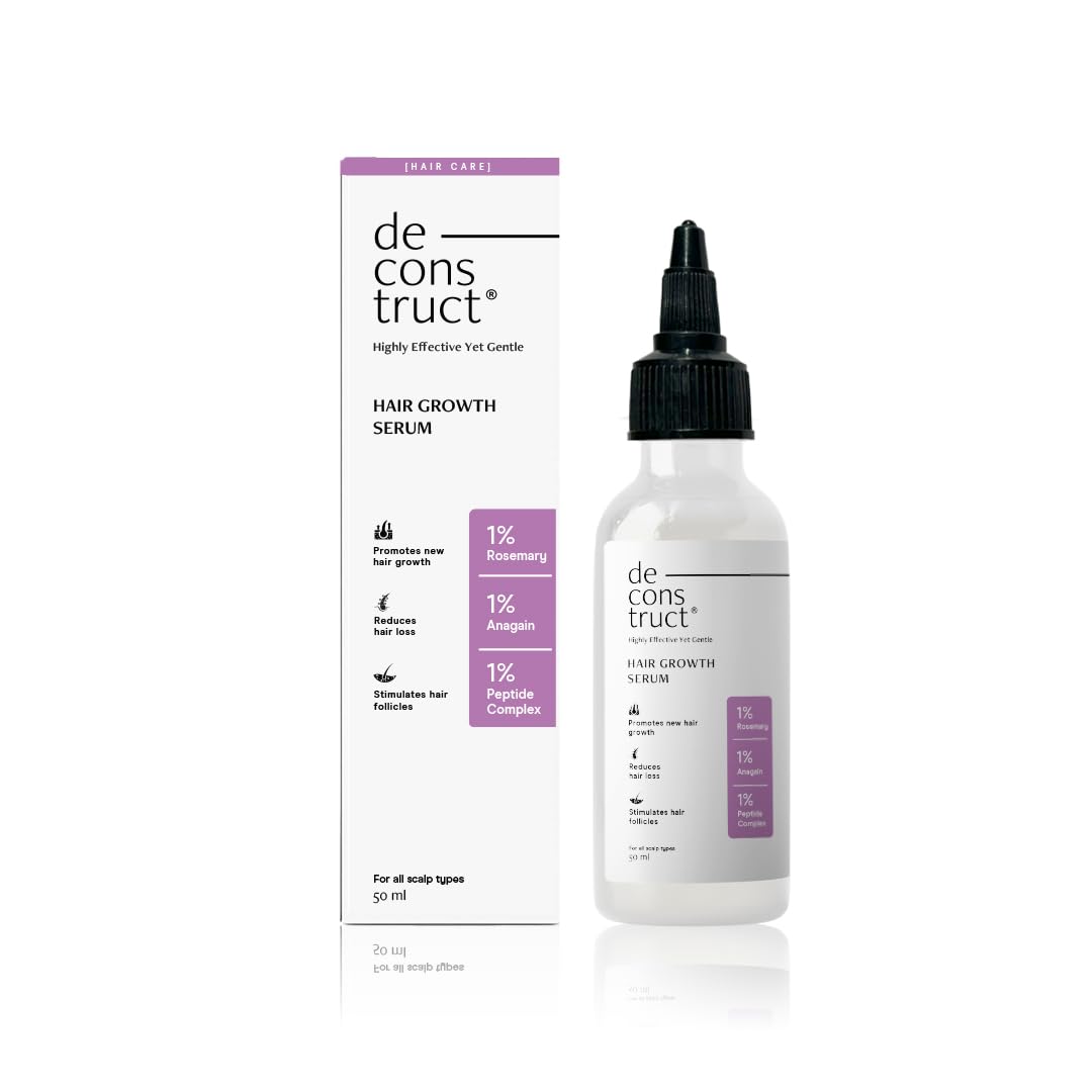 Deconstruct hair growth serum bottle and packaging on a white background