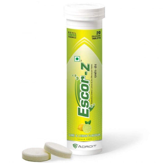 Tube of Escor-Z tablets with two tablets on a white background